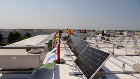Installing the first solar panels at G&W Electric headquarters